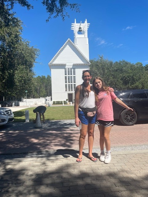 Reagan and friend at beautiful white church