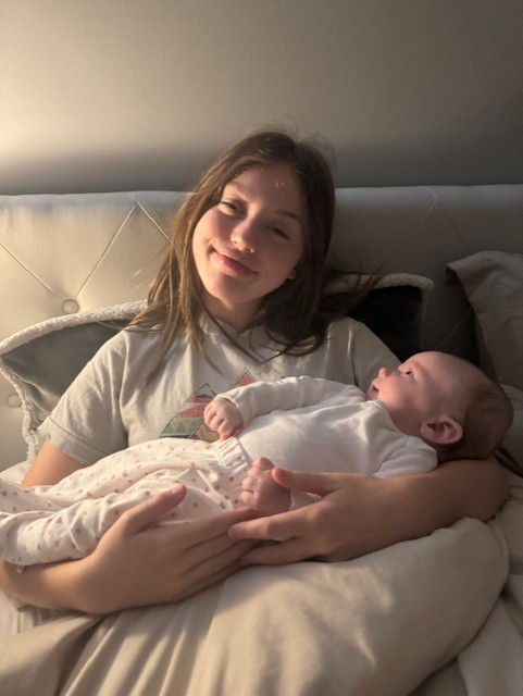 Reagan holding baby in tender moment